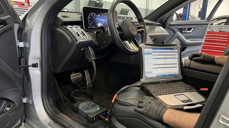 Mercedes Xentry VCI C6 diagnostic interface connected to OBD2 port of a W223 S-Class